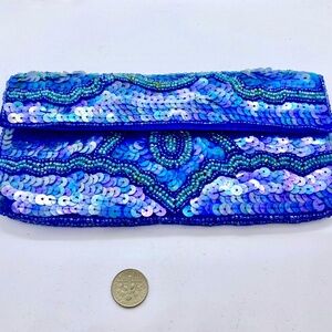 BRILLIANT BLUE SPARKLY CLUTCH FOR DRESSING UP THE NIGHT - LAYERED SEQUENS